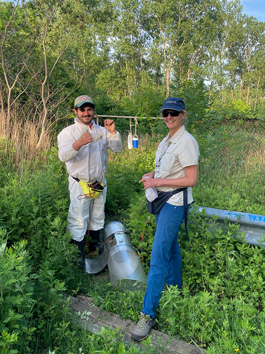 student and mentor collecting mosquitoes